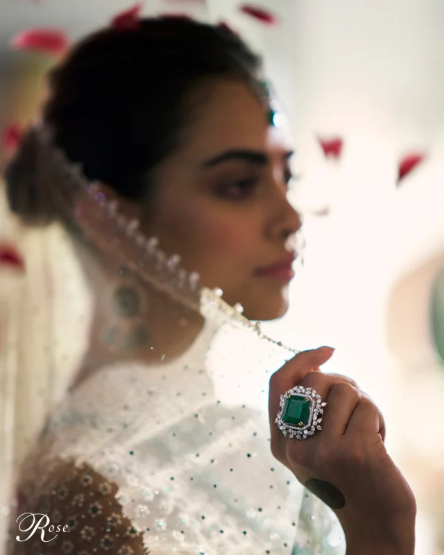 An ode to the Indian bride - adorned in Rose's signature Zambian emerald and natural diamond ring, she carries the weight of tradition with effortless elegance.

Outfit: @taruntahiliani 

#TheHouseofRose #RoseJewellery #LuxuryJewellery #DesignerJewellery #RoseBridal #NaturalDiamonds #Gemstones #Emeralds #HighJewellery #hautejoaillerie #MyTrousseauMyTreasure