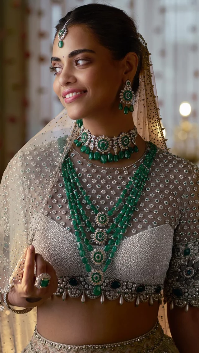 A natural yellow diamond-encrusted choker crafted with Zambian emeralds gracefully pairs with a layered necklace where the emerald beads create a rhythmic flow. 

Outfit: @taruntahiliani 

#TheHouseOfRose #RoseJewellery #LuxuryJewellery #DesignerJewellery #RoseBridal #NaturalDiamonds #Gemstones #Emeralds #HighJewellery #hautejoaillerie #MyTrousseauMyTreasure